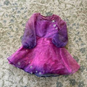Disney Princess Rapunzel "Tangled" dress, featuring sheer long bell sleeves